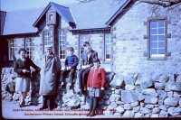 Sandy McLellan with daughter (L) and grand children (R) visiting his Primary School in 1968