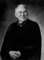John E Simonett