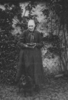 Mary Edgar McLellan with her Bible and dog